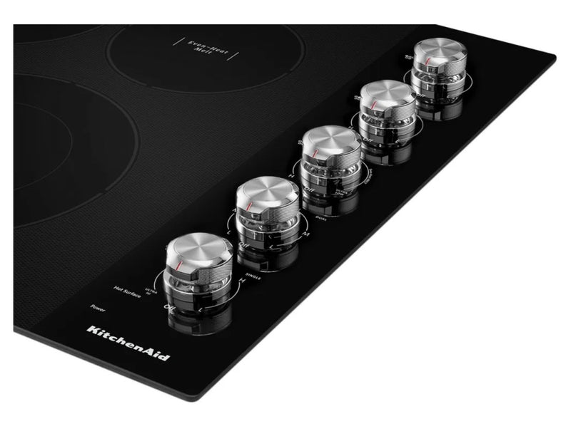 KitchenAid  KCES550HBL
30 Inch Electric Cooktop with 5 Elements, Glass Surface, Even-Heat™ Elements, Ultra Power™ Double-Ring Element, Hot Surface Indicator, Control Lock, Metal Control Knobs, and ADA Compliant: Black